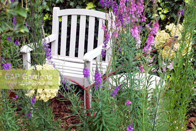 Painted garden chair and table with Linaria and Angelica