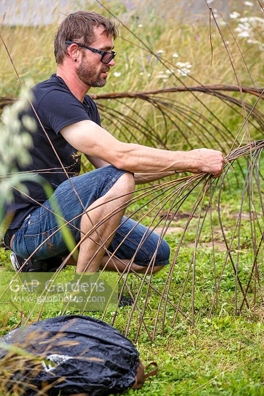 Making a woven willow structure, The Jordans Wildlife Garden, RHS Hampton Court Flower Show 2014