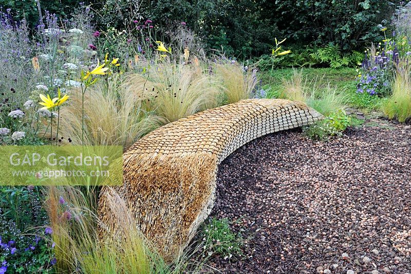 Bench sculpted from straw bales - Jordans Wildlife Garden. Designer: Selina Botham, Sponsors: Jordans Cereals