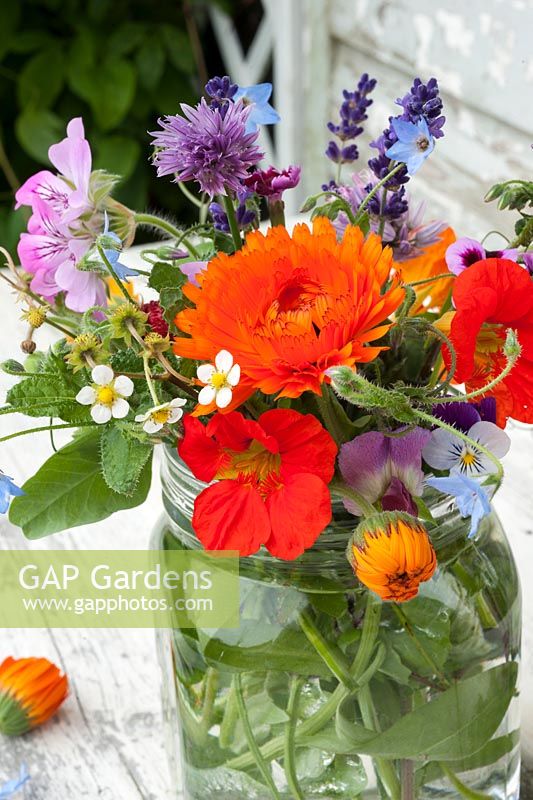 Edible flowers in glass jar - inc calendula, nasturiums, borage, chives, lavandula and violas