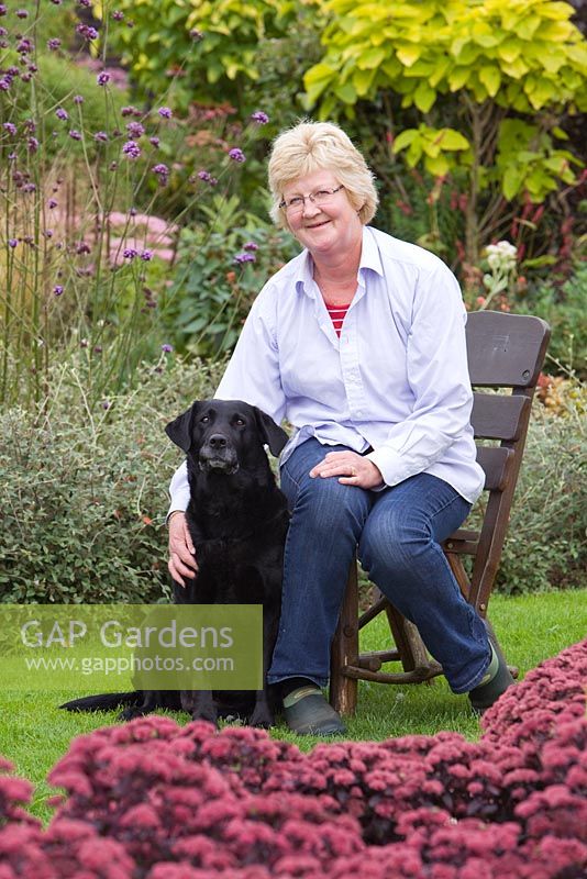 Garden owner Helen Boothman, with her dog Lucy.  September, Autumn 2014.