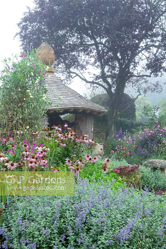 The new Summerhouse in the Cottage Garden, a place for HRH The King to work whilst avoiding showers. September 2013.