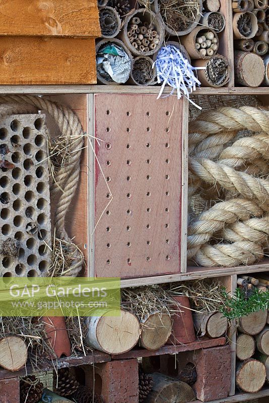 A mixture of natural and man-made materials combining in compartments to make an insect box and wildlife haven
