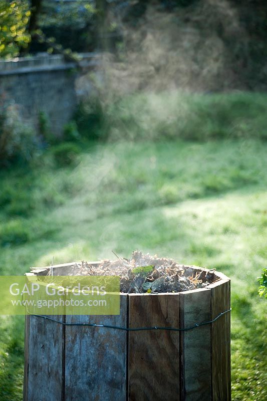 Steam rising from hot compost heap