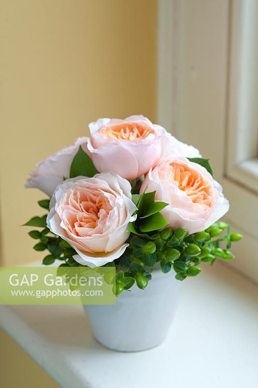 Peach roses in an arrangement. Cut flower roses from David Austin Roses