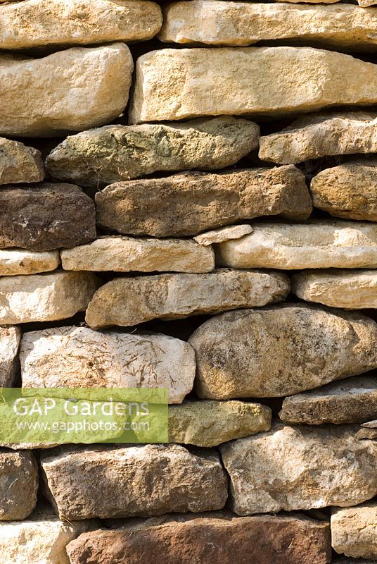 Detail of a dry stone wall using old and new stones
