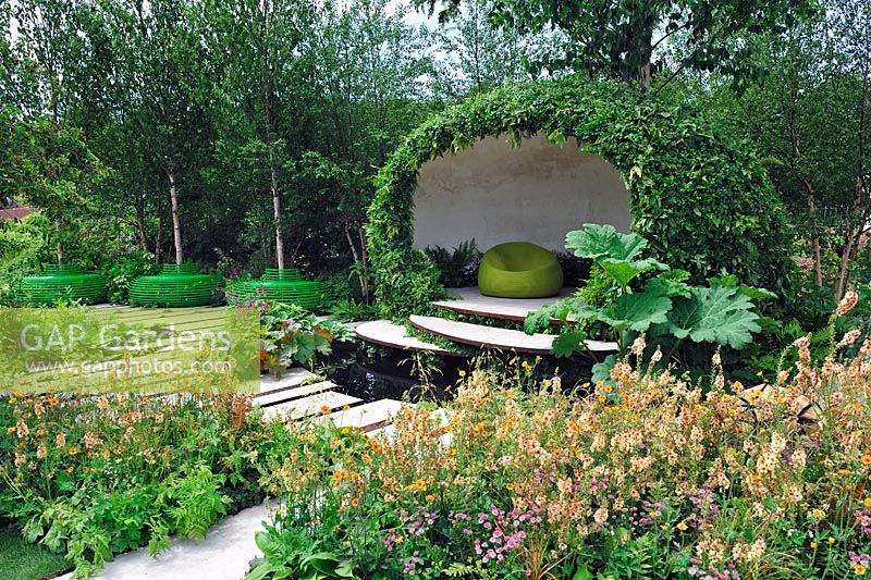 Contemporary pavilion with living green roof and walls, front border with Verbascum 'Firedance', Geum 'Totally Tangerine' - The Macmillan Legacy Garden, RHS Hampton Court Flower Show 2015
