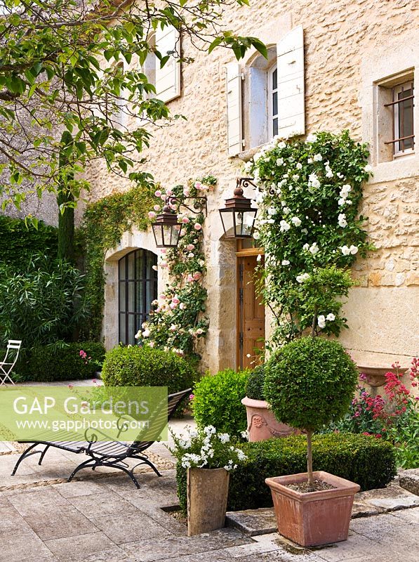 Garden in Luberon, France, Designed by Michel Semini: The front door of the house - Wasserman garden