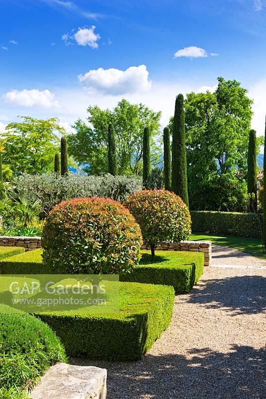 Garden in Luberon, France, Designed by Michel Semini: Formal clipped hedges - Wasserman garden 