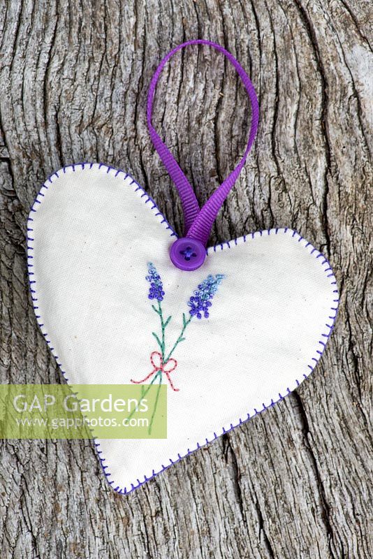 Handmade lavender heart, a heart-shaped, embroidered fabric heart filled with dried lavender.