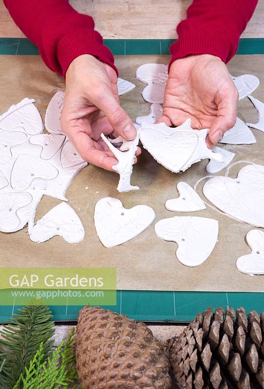 Gently remove the excess clay from around the cut out hearts