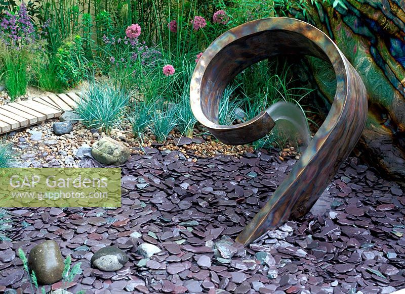 Modern water feature designed by: Brian Harrison. Time and Tide. Design: Sue Adcock. CFS, 2003