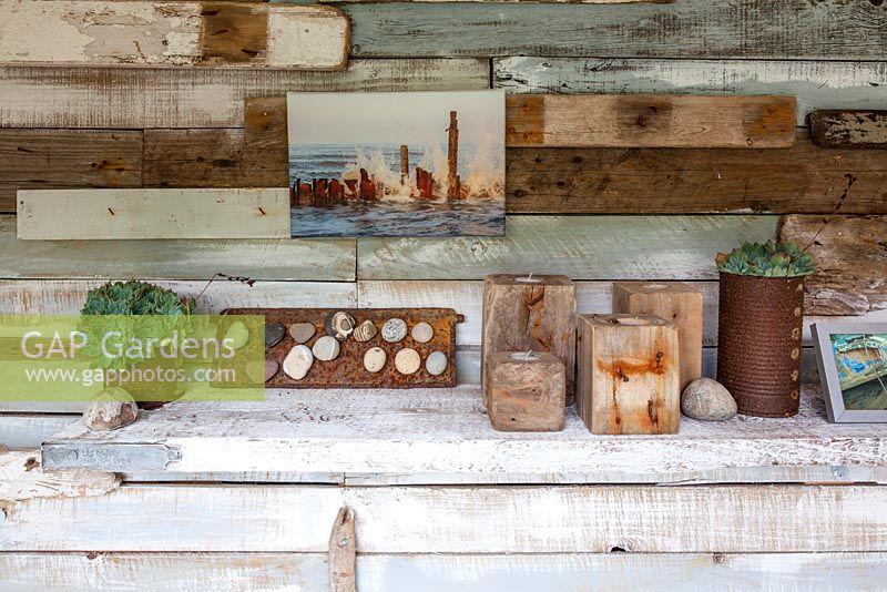 Interior detail of the studio holding Bill's photography. He specialise in details of urban and rural decay, and cannot help but include reference to the local coastline in this paint-washed converted garage.