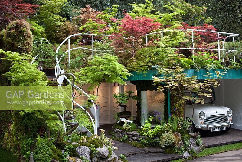Senri-Sentei Garage Garden, depicting a two tier structure housing an antique car, with a roof garden and area for the family to sit and relax. RHS Chelsea Flower Show 2016, Designer: Kazyuki Ishihara, Sponsors: Senri-Sentei Project