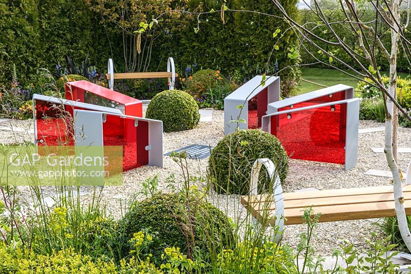 Bespoke central sculpture in Time is a Healer supporting Primrose Hospice, RHS Malvern Spring Festival 2016. Design: Wilson Associates Garden Design. Bronze Medal and  People's Choice Award
