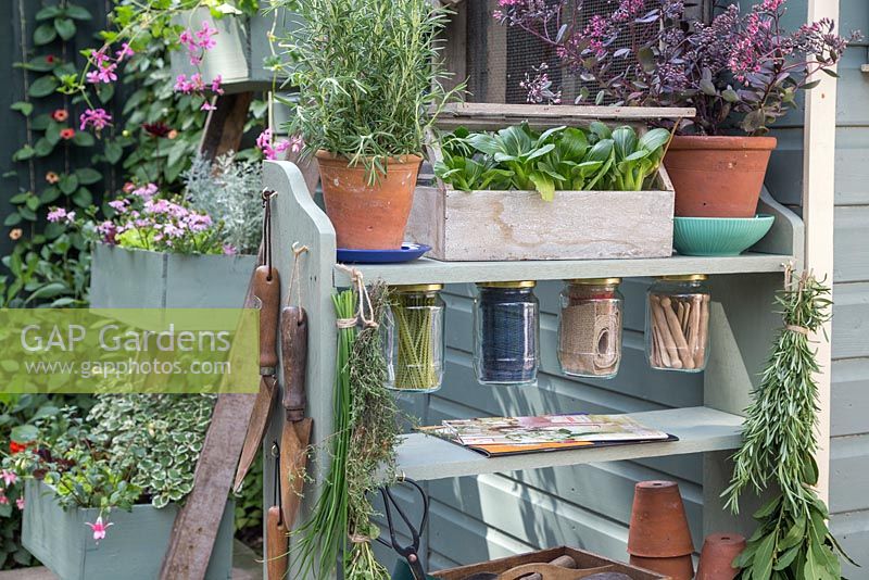 A gardening storage unit made from upcycling book shelves
