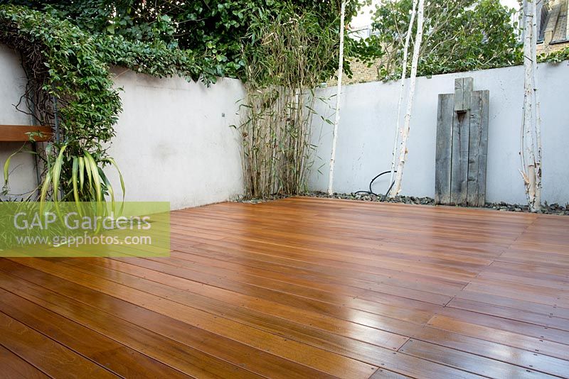 Overall view of decking in small urban garden, finsihed project