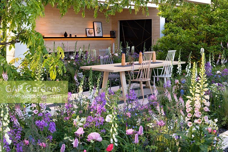 Inspired by Scandinavian design, a contemporary outdoor living space enclosed in perennials in soft pastel shades. The LG Smart Garden, Designer Hay Joung Hwang, RHS Chelsea Flower Show 2016