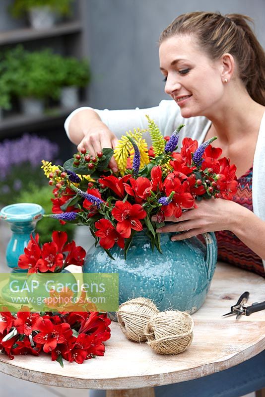 Lady making summer bouquet