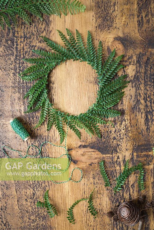 A wreath constructed from green Fern fronds