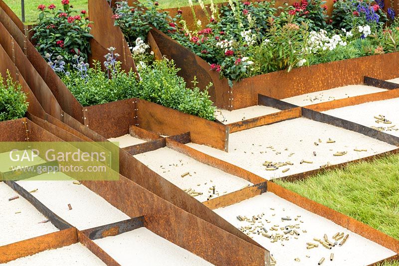 Corten Steel Raised Beds in Peacemaker - Dying Hope Garden, RHS Hampton Court Palace Flower Show 2016.Designer: Kartina Rafaj