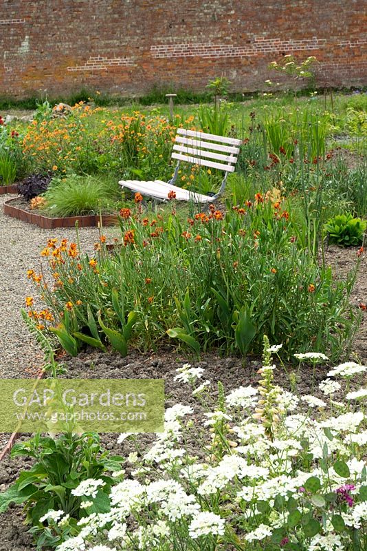 Bench next to the summer borders