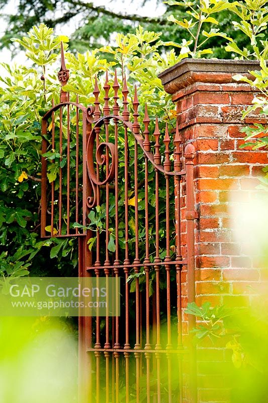 Ornate metal gates. Govone. Garden project by Anna Regge. Piemonte, Italy.