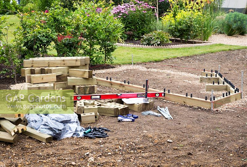 Ingredients needed to construct wooden Woodblocx raised bed