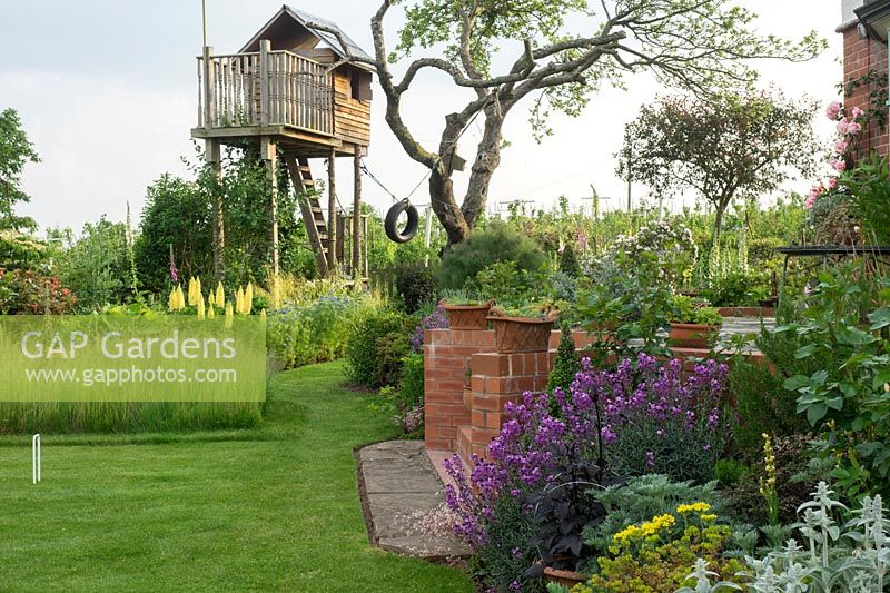 Summer planting with tree house retreat