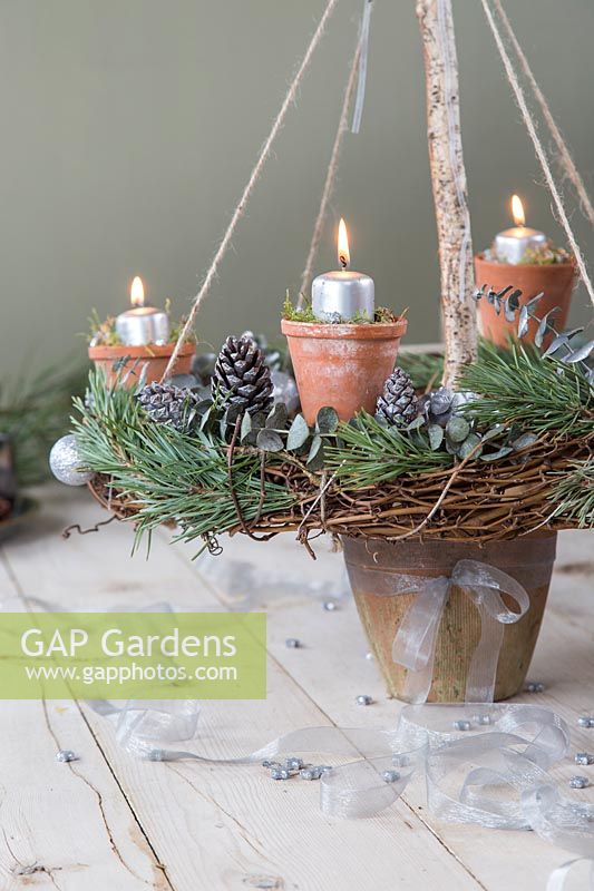 Rustic advent candle holder lit