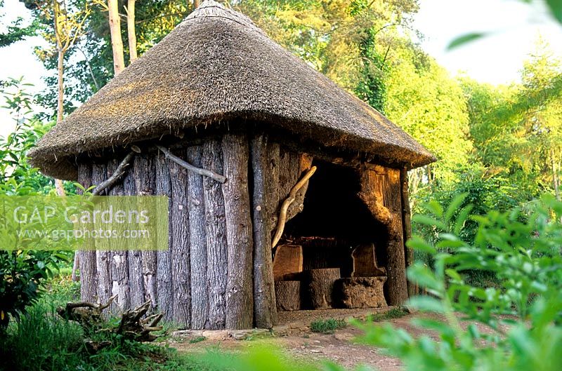 The Witches House Rustic wood building with thatched roof Hestercombe Gardens Somerset