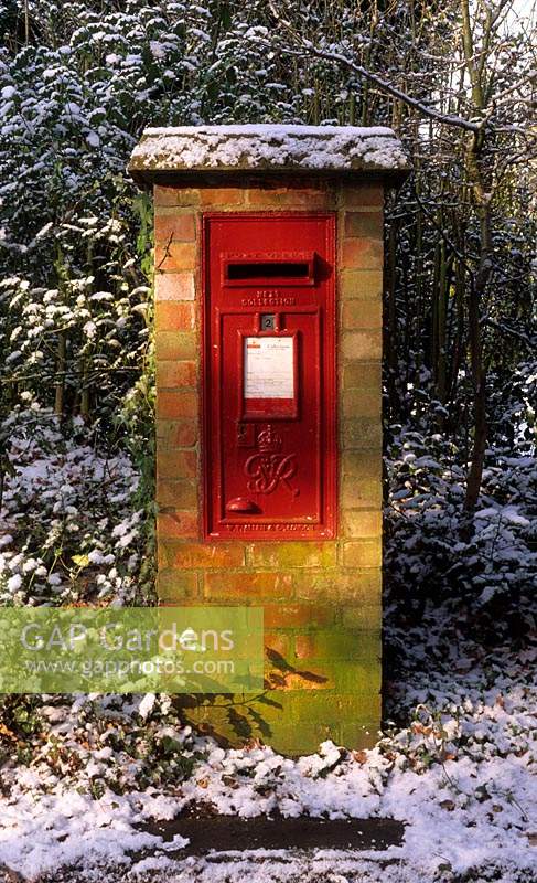 postbox in winter with snow