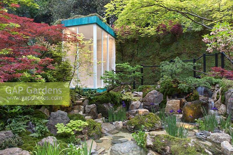 The Green Switch Garden, view of shower room in a Japanese garden with water feature, pond, boulders, Acer trees. Design: Kazuyuki Ishihara. Sponsor: G Lion