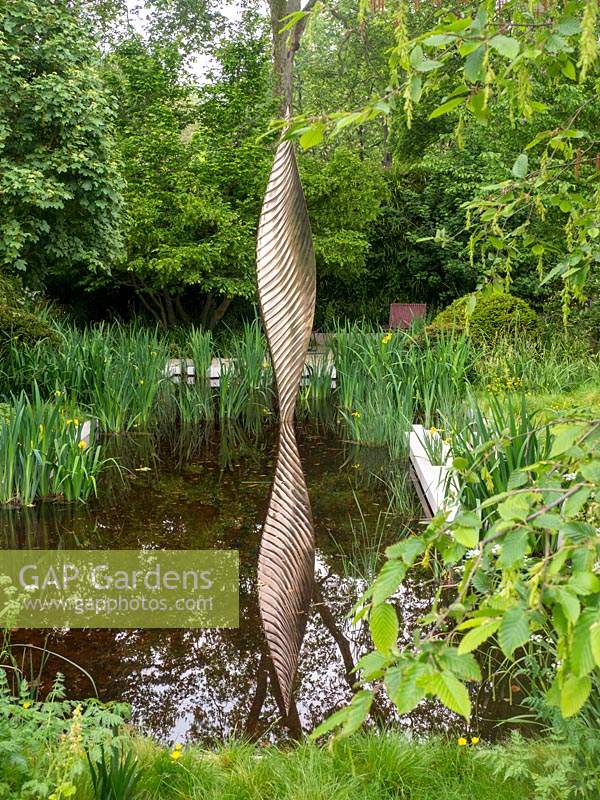 David Harbers bronze sculpture in The Savills and David Harber Garden. Designed by Andrew Duff, Sponsored by David Harber Savills, RHS Chelsea Flower Show, 2019.
