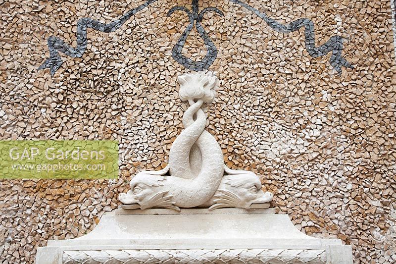 Fountain of The Regaleira. Detail of mosaic and stone  Dolphin fountain. Sintra, Portugal.