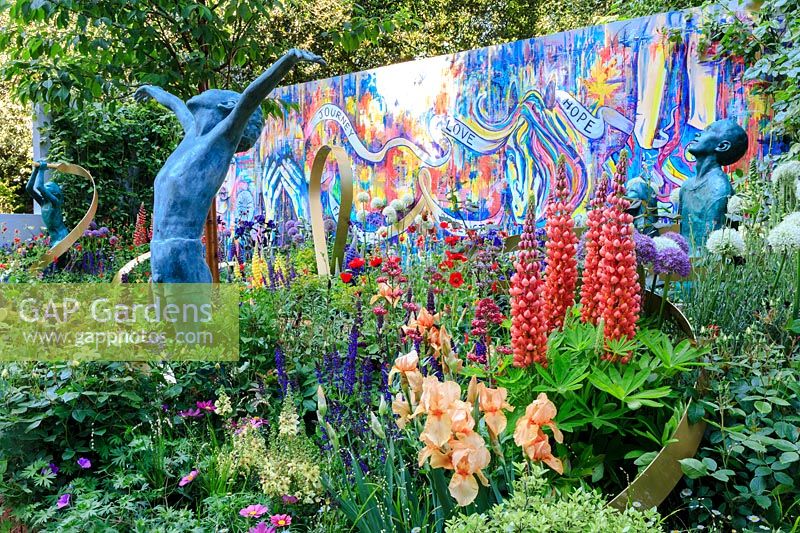 The Supershoes, Laced with Hope Garden, a partnership with Frosts. Sponsor: Frosts Garden Centres, RHS Chelsea Flower Show, 2018. Sculpture by Alison Bell. 