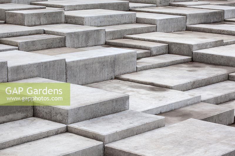 The tiered surface of concrete blocks for walking or sitting