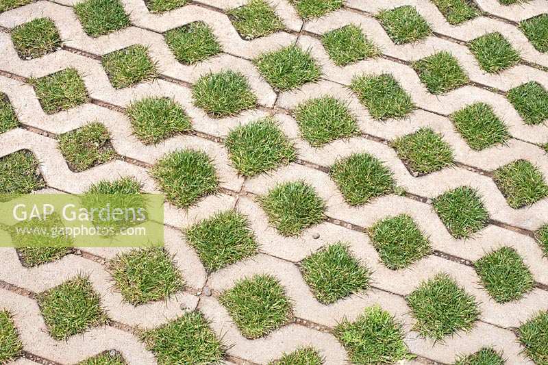 Concrete block and grass pavers to prevent flooding