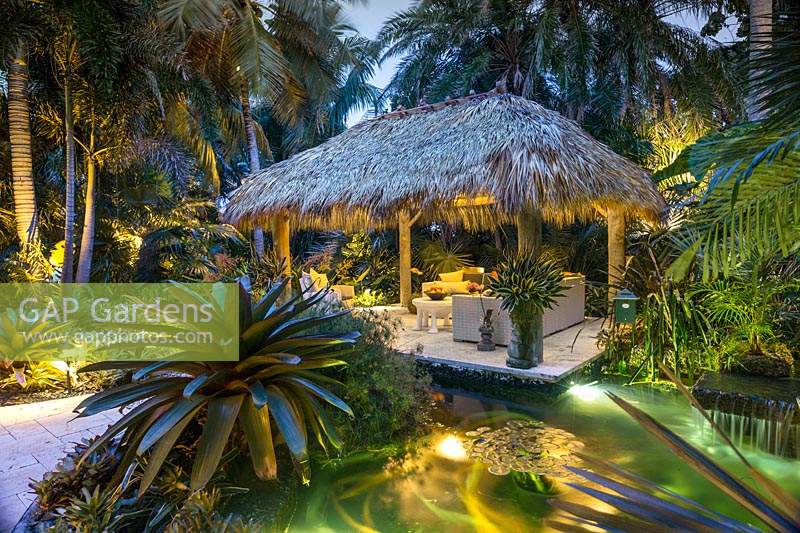 The chickee hut and pond at The Jones Residence, Key West, Florida, USA. Garden design by Craig Reynolds.
