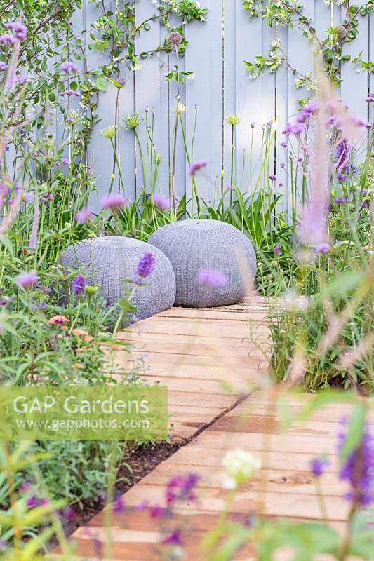 View along decking path to a Stephanie Cushing sculpture surrounded by 
Verbena bonariensis, Agastache 'Blackadder' and Veronicastrum virginicum 'Fascination'
in 'Southend Young Offenders': A Place to Think' garden 
 