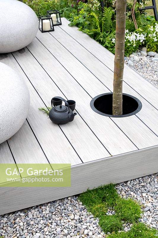 'Space Within Mindfulness' garden - raised deck with hole for tree