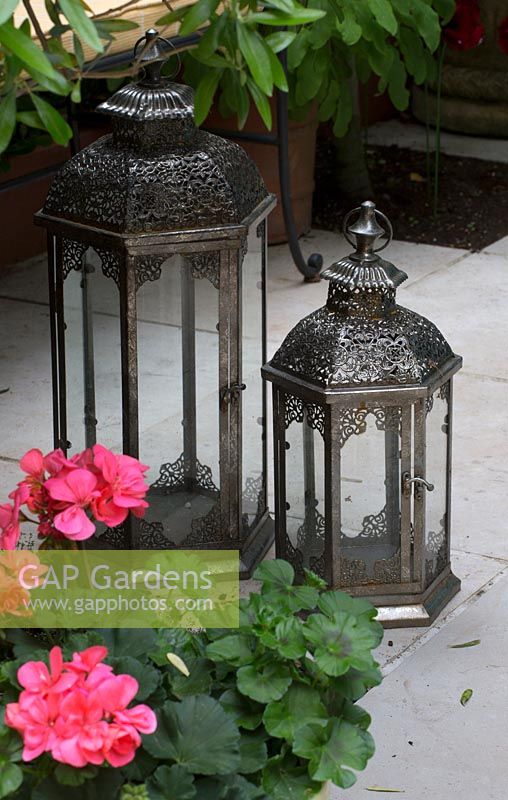 Pair of decorative lanterns in Moroccan themed courtyard