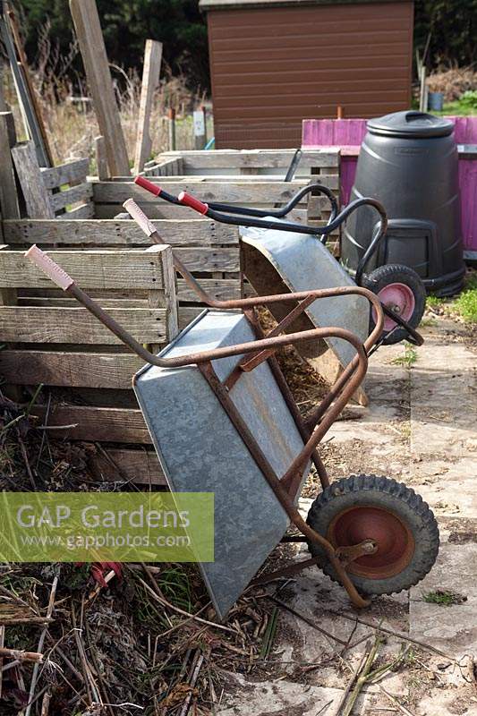 Wheelbarrows and compost heaps