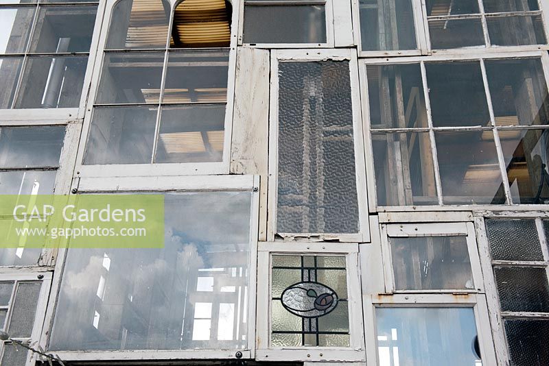 Recycled sash windows that make up the giant glasshouse lantern at the Skip Garden, Kings Cross
