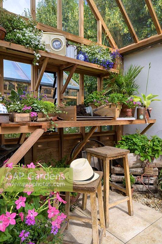 Inside greenhouse: potting table 