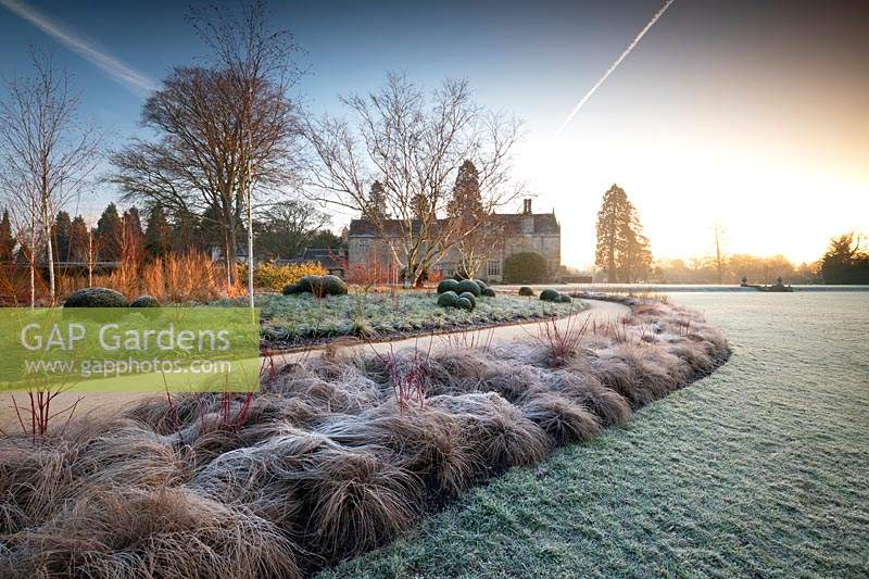 View of the Winter Garden and sweeping path at Wakehurst, West Sussex, UK