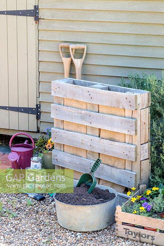 Tools and materials required to make a rainbow pallet planter