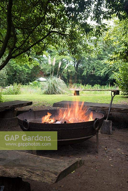 The fire pit overlooking the Wild Pond. 