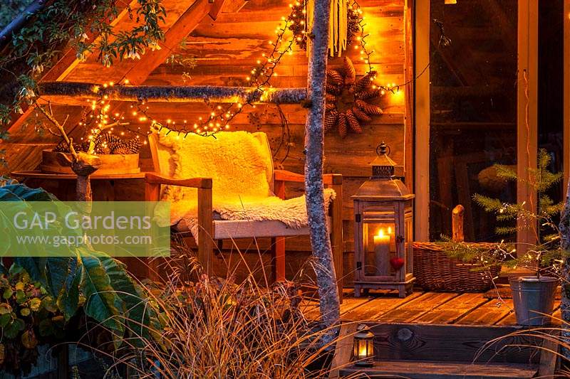 Garden room decorated with fairy lights in December