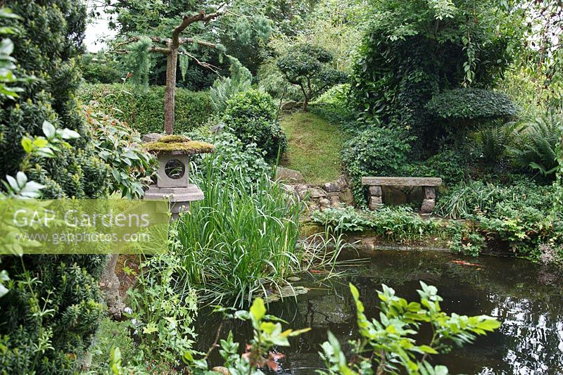 Japanese lantern by the koi pond at Pure Land Japanese Meditation Garden